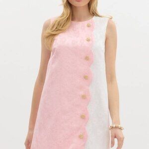 Sleeveless dress with button jacquard